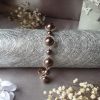 Bracelet en perles de cristal nacré et rocailles calibrées