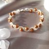 Bracelet en perles de cristal nacré et rocailles calibrées