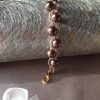 Bracelet en perles de cristal nacré et rocailles calibrées