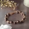 Bracelet en perles de cristal nacré et rocailles calibrées