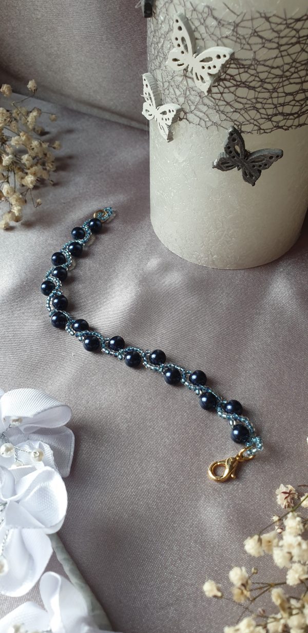 Bracelet en perles de cristal nacré et rocailles calibrées