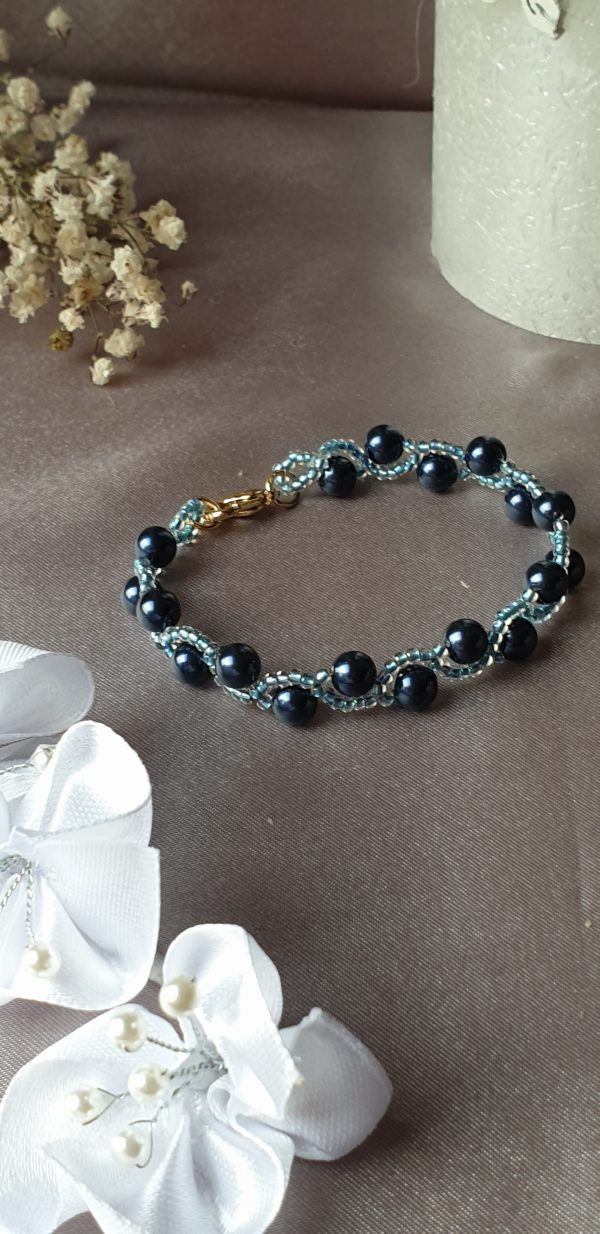 Bracelet en perles de cristal nacré et rocailles calibrées
