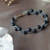 Bracelet en perles de cristal nacré et rocailles calibrées