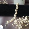 Bracelet en perles de cristal nacré et rocailles calibrées
