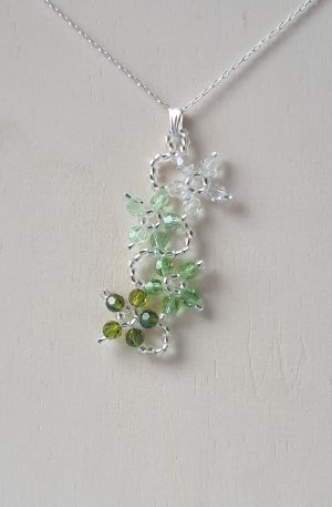 Pendentif fleurs en purs cristaux