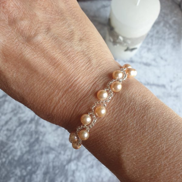 Bracelet en perles de cristal nacré et rocailles calibrées