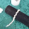 Bracelet en perles de cristal nacré et rocailles calibrées