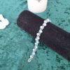 Bracelet en perles de cristal nacré et rocailles calibrées